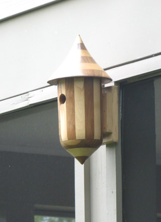Mounting a birdhouse on slippery siding of a house